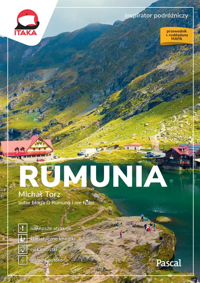 Okładka przewodnika turystycznego „RUMUNIA” wydawnictwa Pascal i biura Itaka, autorstwa Michała Torza. Tło stanowi zdjęcie górzystego krajobrazu z turkusowym jeziorem i schroniskiem o czerwonym dachu. U góry widnieje napis „inspirator podróżniczy”, a na dole wymieniono zawartość: najlepsze atrakcje, klimatyczne knajpki, ciekawostki oraz porady autora.